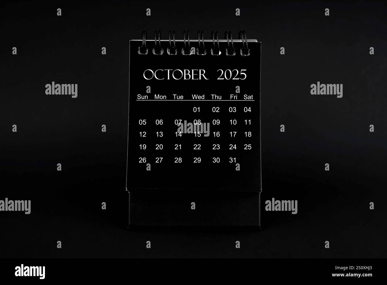 Black Calendar For October 2025 Desktop Calendar On A Black Color Background Stock Photo Alamy